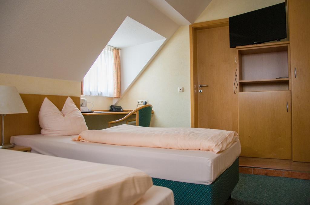 Domizil Alte Post Hotell Püttlingen Rum bild